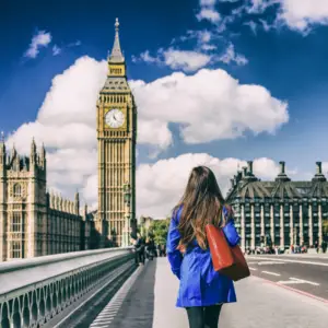 Woman walking in London in front of Big Ben