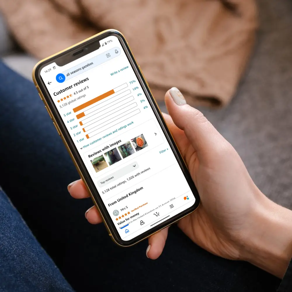 hand holding phone that shows customer reviews on amazon